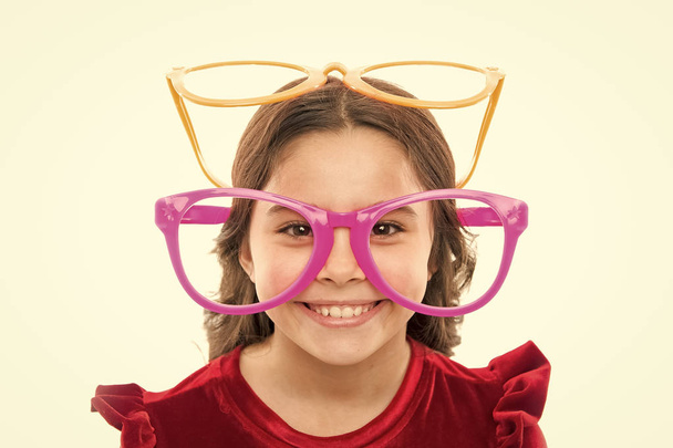 Portrait of happy little child. Birthday party. Little girl in party glasses. small girl greeting summer. Childhood and happiness. Childrens day. Kid fashion and style. young fashion expert - Photo, Image