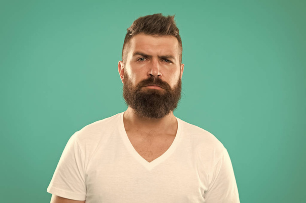 Barber salon. Beard fashion and barber concept. Man bearded hipster stylish beard turquoise background. Barber tips maintain beard. Stylish beard and mustache care. Hipster appearance. Male beauty - Fotoğraf, Görsel