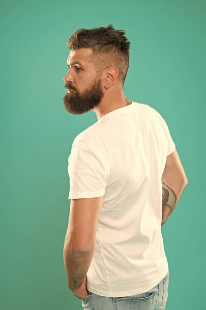 Beard fashion and barber concept. Man bearded hipster stylish beard turquoise background. Barber tips maintain beard. Stylish beard and mustache care. Hipster appearance. Styling beard supplies - Photo, image