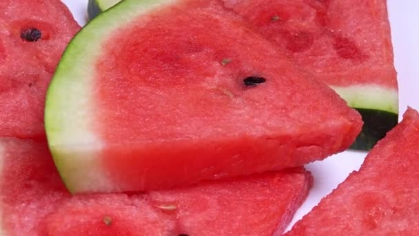Sliced watermelon on white plate - Footage, Video