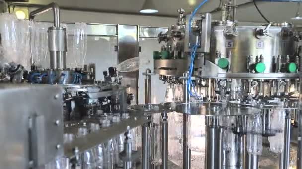 Plant for the production of mineral water. Water bottling in plastic white - Footage, Video