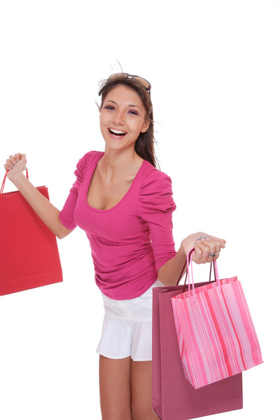 Happy woman with pink shopping bags - Φωτογραφία, εικόνα