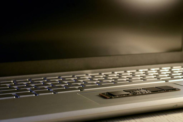 Chip SSD drive on the trackpad, bottom side view.  - Valokuva, kuva
