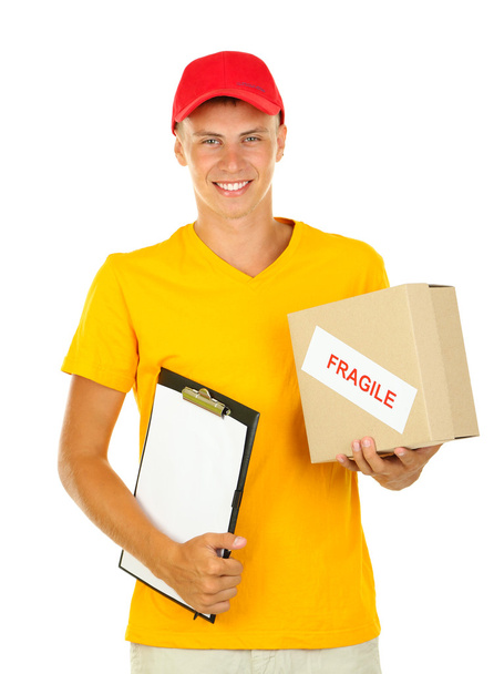 Young delivery man with parcel and clipboard, isolated on white - Фото, зображення