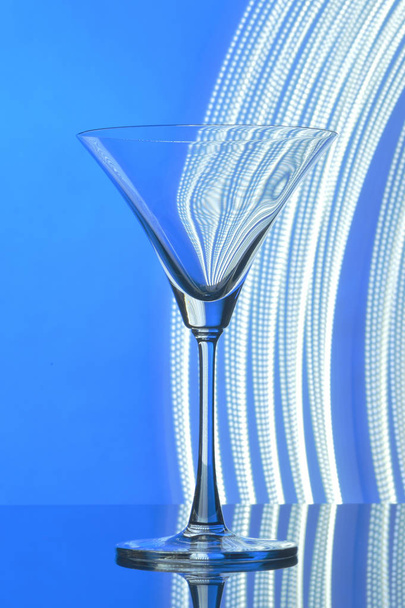 martini glass on backlight background - Foto, Imagen