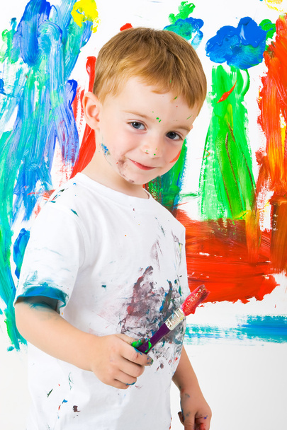 Child painting on wall - Foto, immagini
