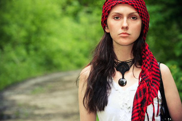 Girl in a red kerchief - Foto, afbeelding