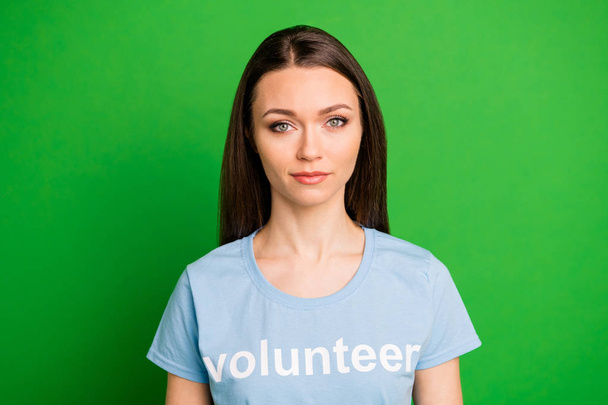 Close-up portrait of her she nice-looking attractive lovely calm content straight-haired girl girl wearing print tshirt isolated over bright vivid shine green lime background - Foto, imagen