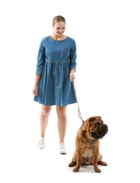 Happy woman with cute dog on white background - Fotó, kép