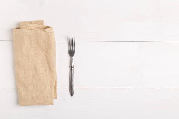 top view of fork and knife on checkered napkin - Photo, Image