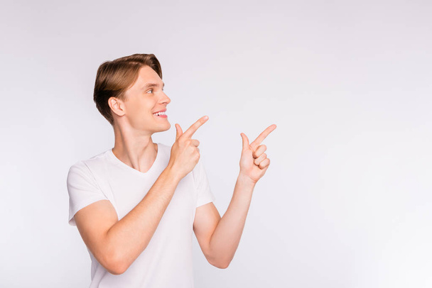 Photo of nice guy indicating fingers up empty space on cool prices wear casual outfit isolated white background - Zdjęcie, obraz