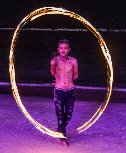 Fire show on the beach in Koh Samui in Thailand - Photo, Image