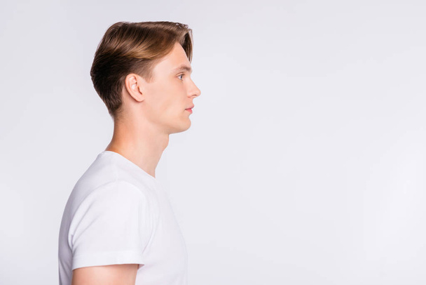 Close-up profile side view portrait of his he nice cute attractive calm guy copy empty blank space place isolated over light white pastel background - Φωτογραφία, εικόνα