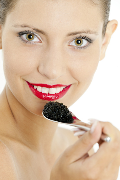 Woman with black caviar - Photo, Image