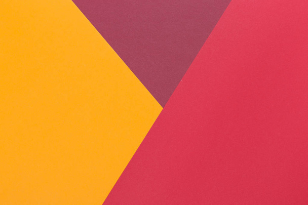 Paper yellow, burgundy, red empty background, geometrically located. Color blank for presentations, copy space. - Foto, Bild