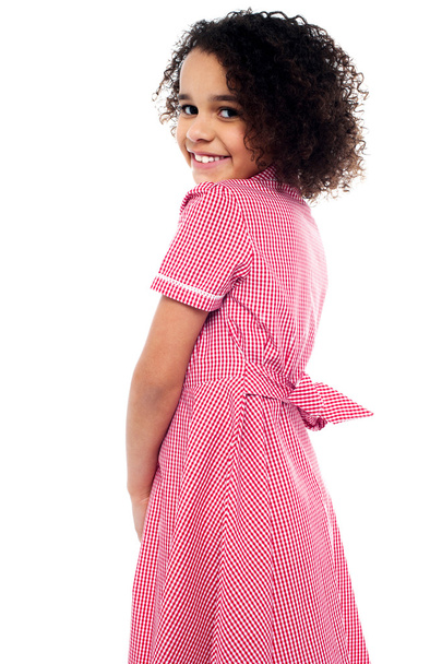 Shy school girl in pink uniform - Фото, зображення