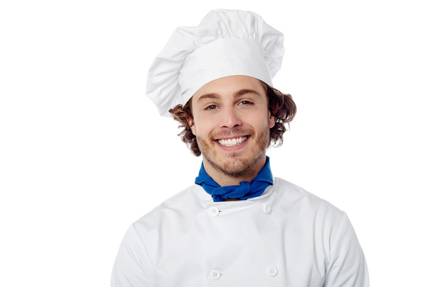 Young male chef wearing toque - 写真・画像