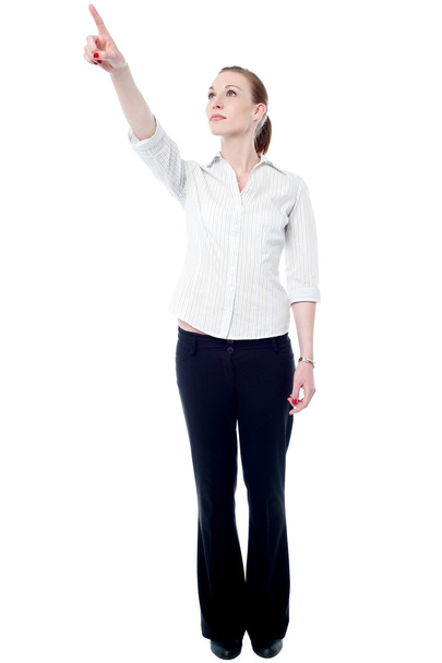 Young business executive pointing upwards - Foto, Imagem