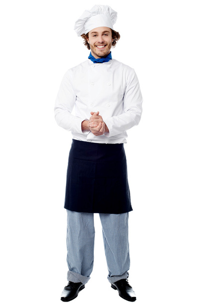 Full length portrait of a handsome chef - Foto, afbeelding