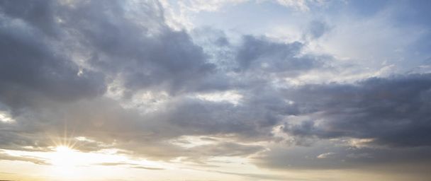 Amazing evening cloudy sky boarder background - Foto, imagen