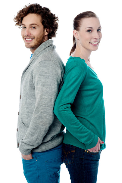 Fashion couple posing back to back - Fotografie, Obrázek