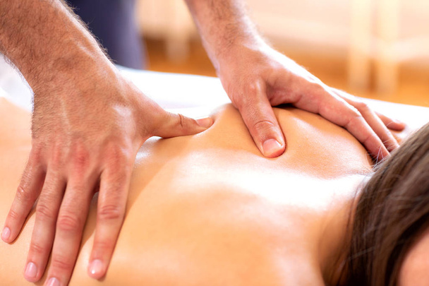 Massage therapy in a beauty salon - Photo, Image