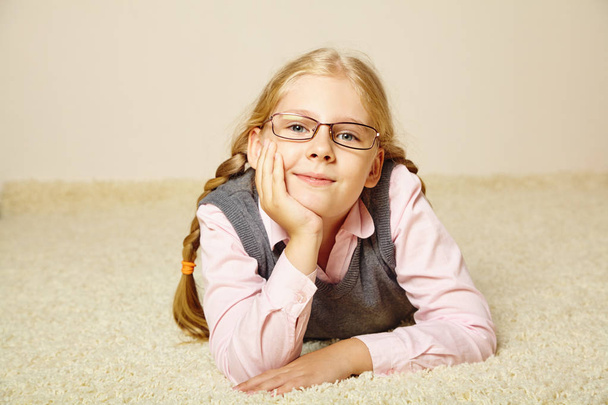 portrait of a schoolgirl with glasses. child at home. - Fotoğraf, Görsel