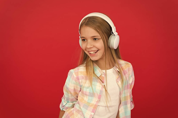 Online radio station channel. Girl child listen music modern headphones. Get music account subscription. Enjoy music concept. Music always with me. Leisure concept. Little girl listen song headphones - Foto, immagini
