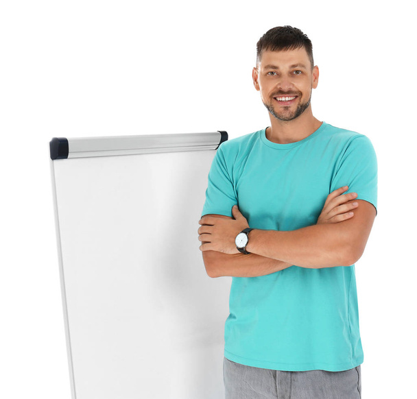 Professional business trainer near flip chart board on white background - Photo, image