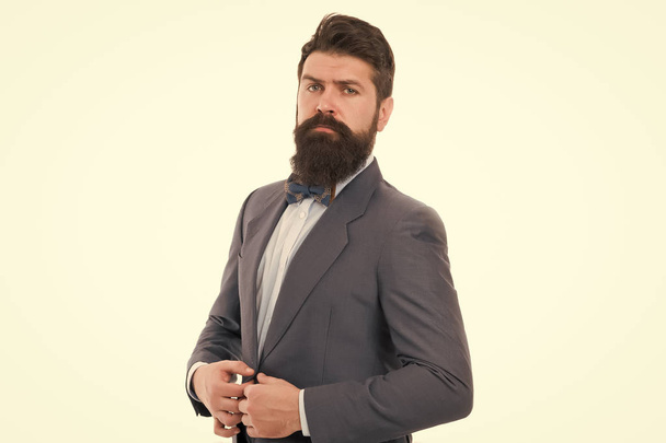 Confident posture. Businessman or host fashionable outfit isolated white. Man bearded hipster wear classic suit outfit. Formal outfit. Take good care of suit. Elegancy and male style. Fashion concept - Фото, изображение