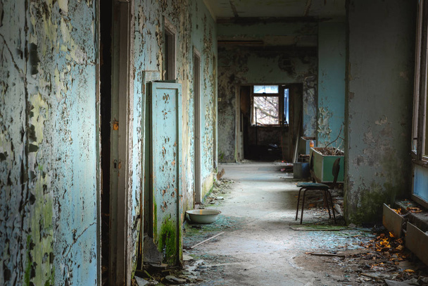 Abandoned corridor in Pripyat Hospital, Chernobyl Exclusion Zone 2019 - Fotoğraf, Görsel