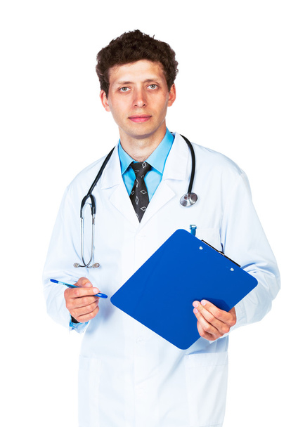 Πορτρέτο του νεαρό αρσενικό γιατρό εγγράφως σχετικά με ιατρικά cha του ασθενούς - Φωτογραφία, εικόνα