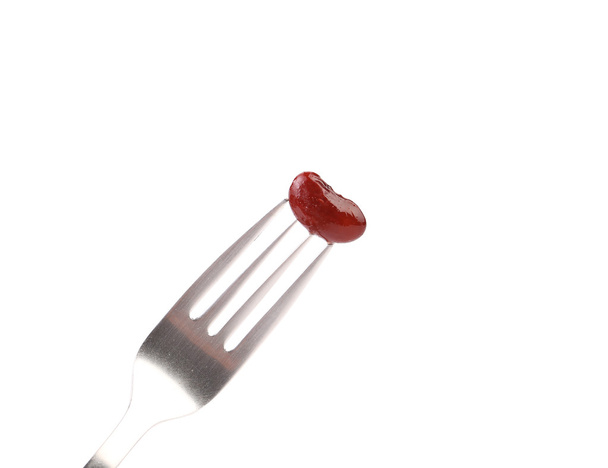 Single canned bean on fork - Photo, Image