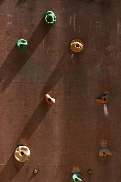 Climbing wall close-up  / The close-up of a climbing wall with rubber rungs - Photo, Image