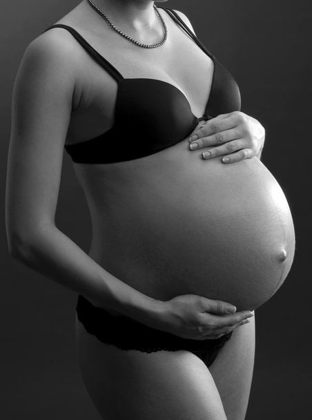she is in her nine month of pregnancy - Photo, image