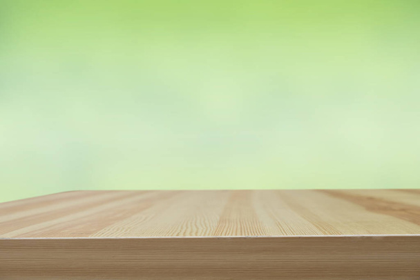 Wood table top on blur nature background - Foto, imagen
