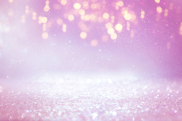 background of abstract glitter lights. purple, pink, gold and silver. de focused - Photo, Image