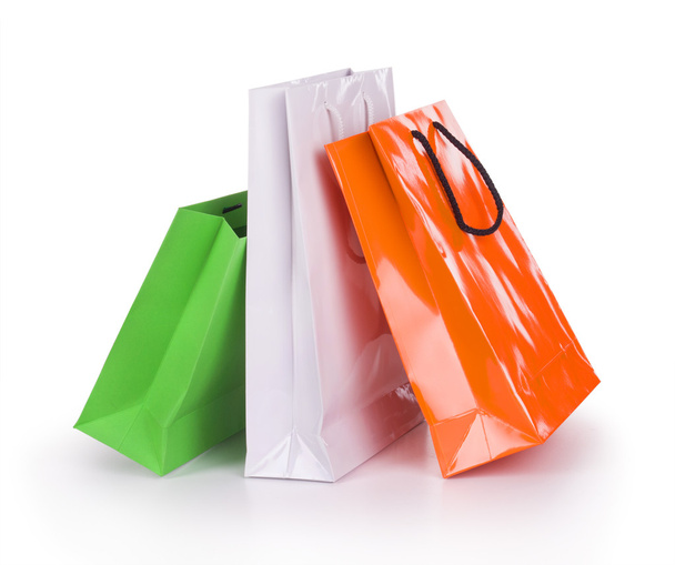 Paper shopping bags isolated on white background - 写真・画像