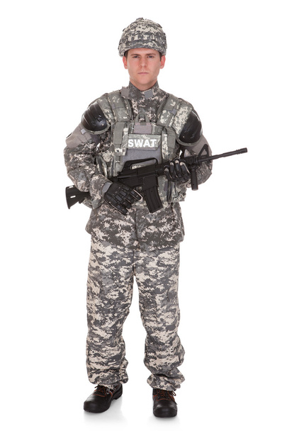 Portrait Of Solider Holding Rifle - Фото, изображение