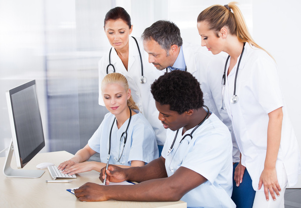 Group Of Doctors Working Together - 写真・画像