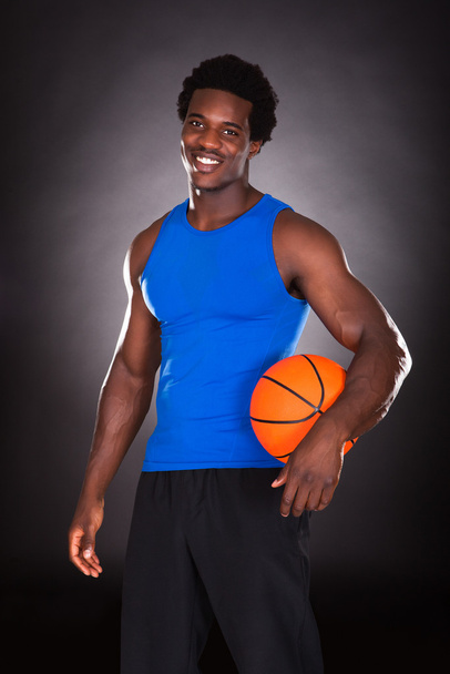 African Man With Basketball - Фото, изображение