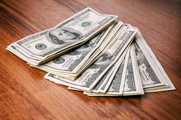 χρήματα (δολάρια) στο τραπέζι - Φωτογραφία, εικόνα