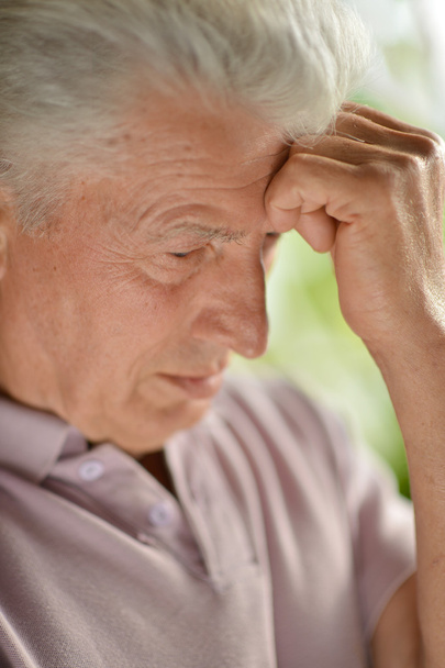 Close-up portrait of a senior man thinking about something - Foto, Imagem