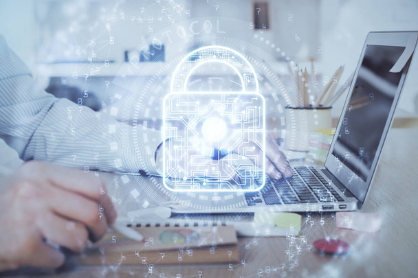Double exposure of lock icon with man working on computer on background. Concept of network security. - Photo, Image