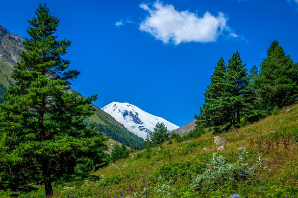 Elbrus is the highest mountain peak in Russia and Europe. Due to the well-developed transport and related infrastructure, Elbrus and the surrounding areas are very popular in recreational, sports, tou - Photo, Image