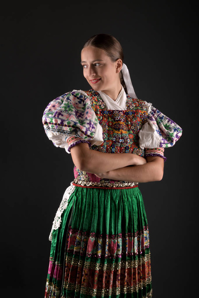 Slovak folklore Traditional woman costume. - Фото, изображение
