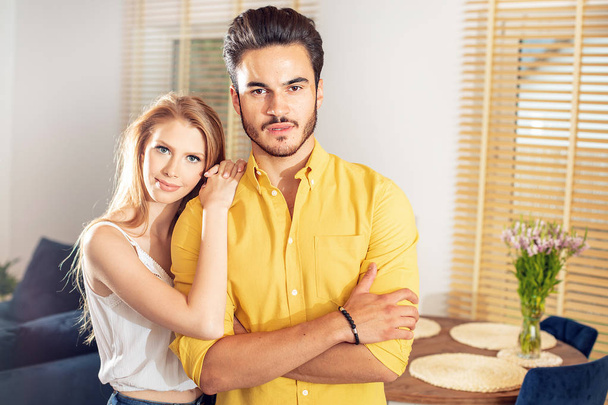 Young couple posing together in new home . - Fotoğraf, Görsel