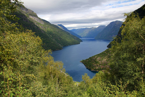 a mountain top above a fjord with magnificent landscape - Foto, Imagem