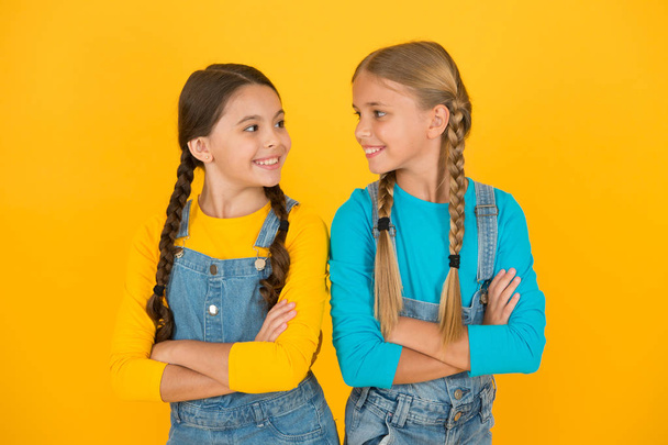 Patriotic upbringing. Independence day. We are ukrainians. Ukrainian kids. Children ukrainian young generation. Celebrate national holiday. Patriotism concept. Girls with blue and yellow clothes - Photo, image