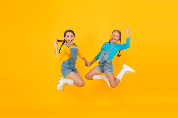 Freedom value. Living happy life in free country. Patriotic upbringing. Patriotism concept. Girls with blue and yellow clothes. We are ukrainians. Ukrainian kids. Children ukrainian young generation - Photo, Image